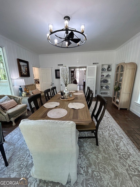1156 South Main Street Moultrie, GA 31768 - Photo 17 of 56 a living room with furniture a chandelier a mirror and a large window