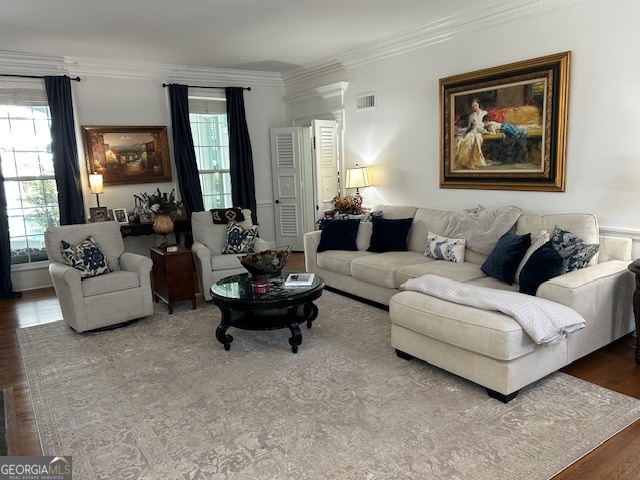 1156 South Main Street Moultrie, GA 31768 - Photo 19 of 56 a living room with furniture and a painting on the wall