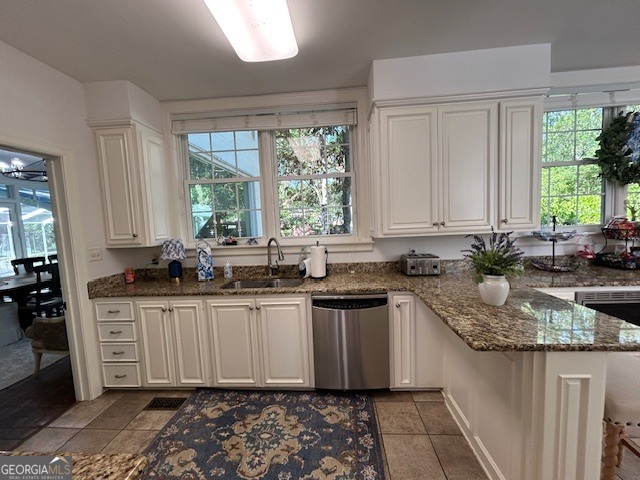 1156 South Main Street Moultrie, GA 31768 - Photo 25 of 56 a kitchen with granite countertop a sink and a stove