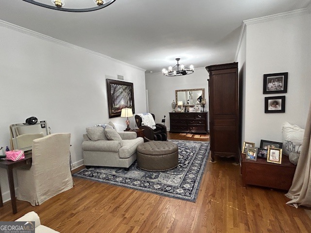 1156 South Main Street Moultrie, GA 31768 - Photo 32 of 56 a living room with furniture and a wooden floor