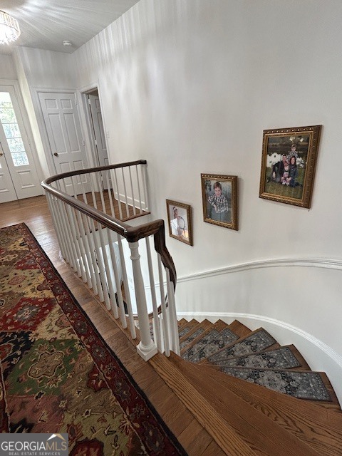 1156 South Main Street Moultrie, GA 31768 - Photo 44 of 56 a view of staircase with lots of frames on wall