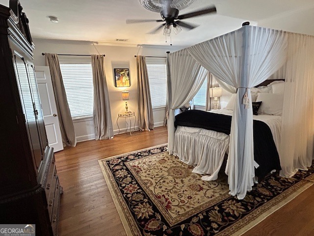 1156 South Main Street Moultrie, GA 31768 - Photo 47 of 56 a living room with wooden floor furniture and a fireplace