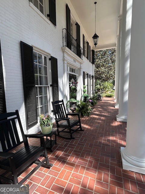 1156 South Main Street Moultrie, GA 31768 - Photo 5 of 56 a view of a patio with a dining table and chairs