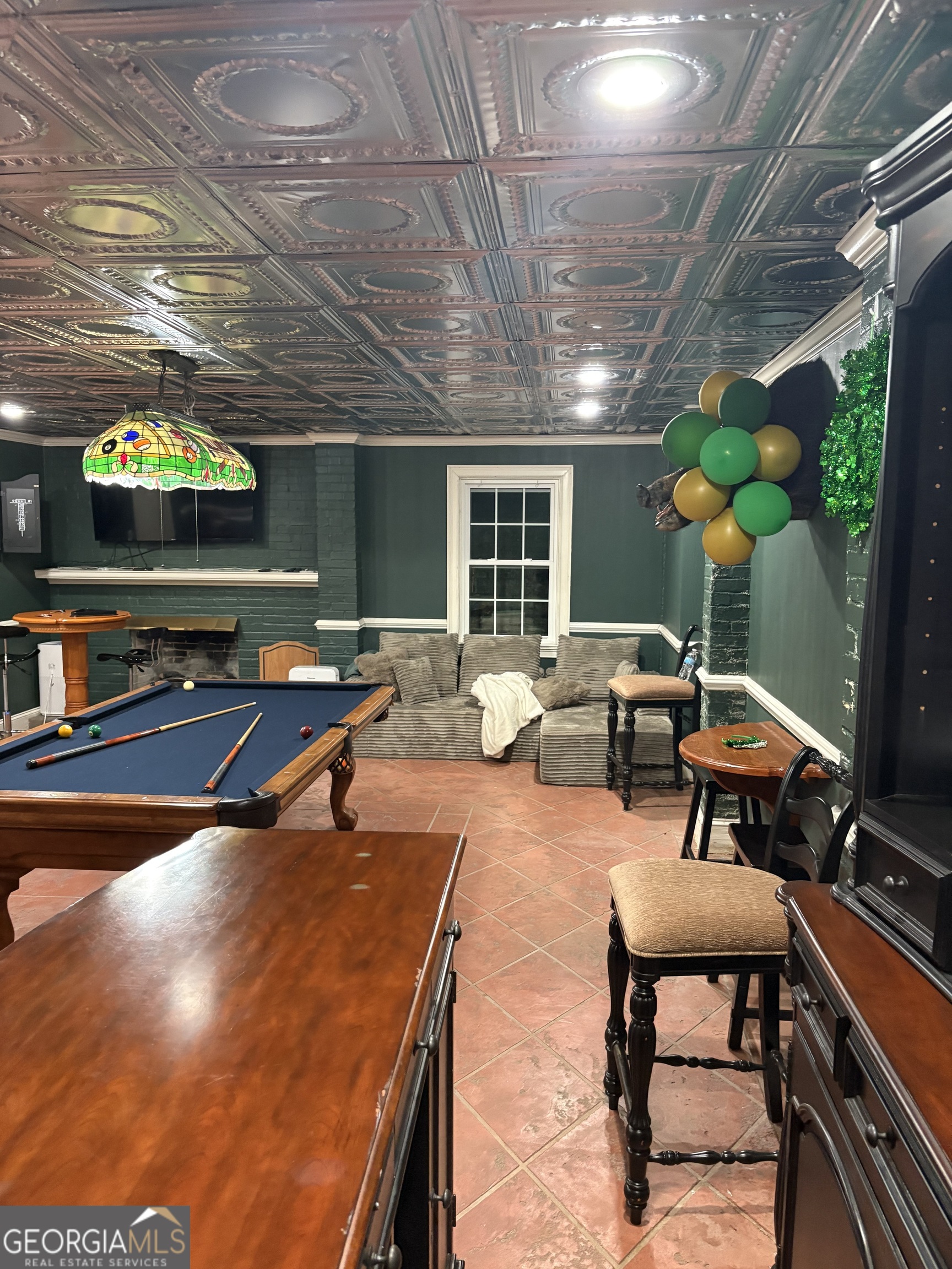 1156 South Main Street Moultrie, GA 31768 - Photo 51 of 56 a patio with patio table and chairs