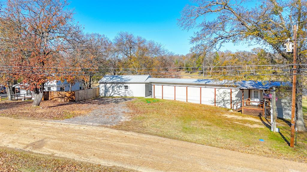 128 Meandering Way Mabank, TX 75156 - Photo 11 of 38 a view of residential houses with yard and swimming pool