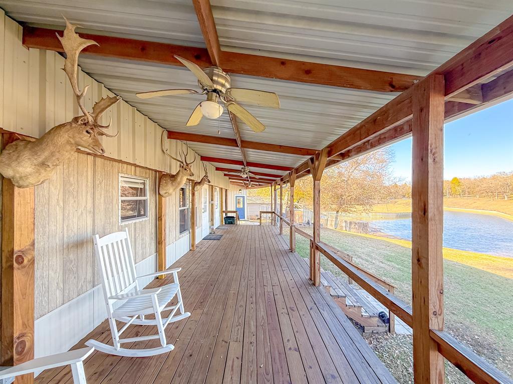 128 Meandering Way Mabank, TX 75156 - Photo 20 of 38 a view of a room with wooden floor and windows