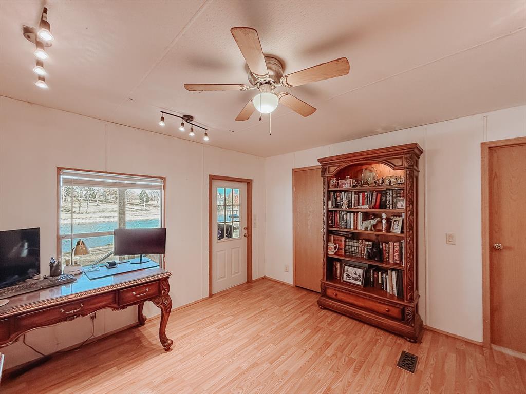 128 Meandering Way Mabank, TX 75156 - Photo 26 of 38 a living room with furniture and a window