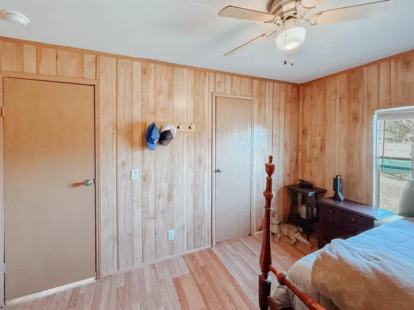 a bathroom with a toilet a sink and shower