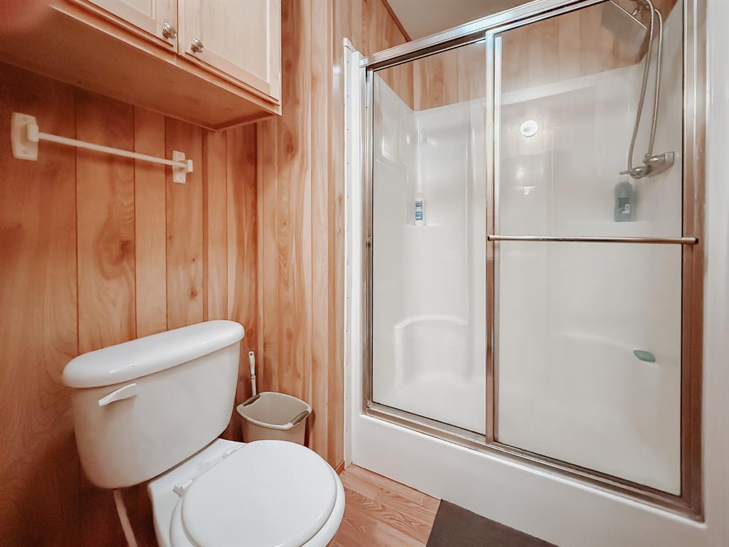 128 Meandering Way Mabank, TX 75156 - Photo 33 of 38 a bathroom with a toilet a sink and shower