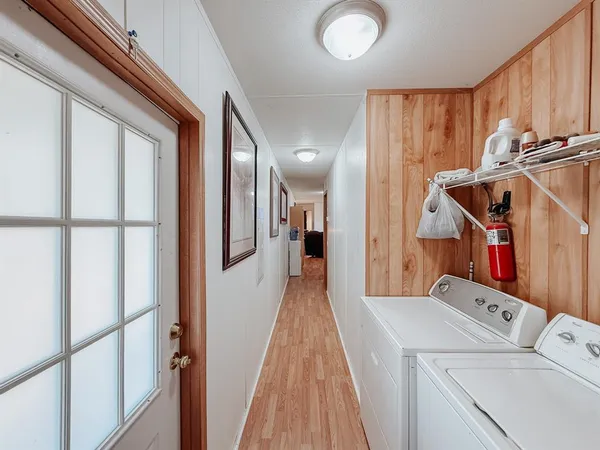 a white toilet sitting next to a shower curtain