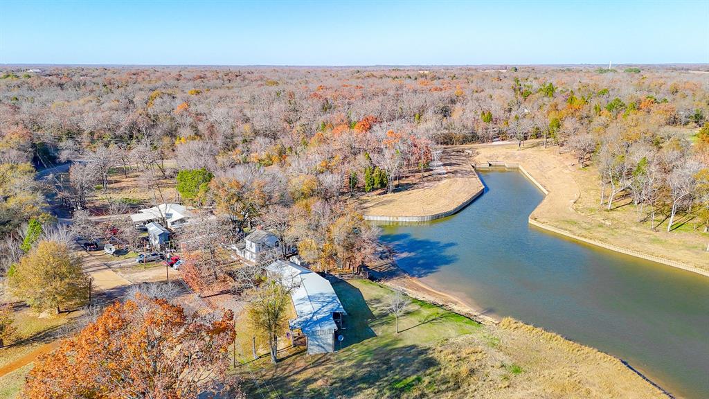 128 Meandering Way Mabank, TX 75156 - Photo 4 of 38 wooden floor with water view