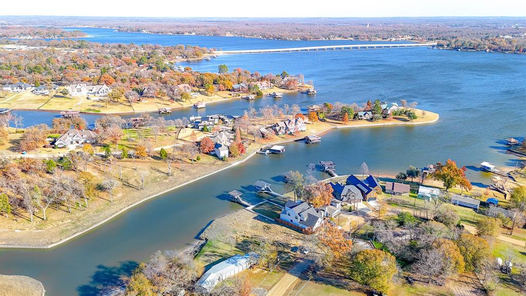128 Meandering Way Mabank, TX 75156 - Photo 7 of 38 an aerial view of a house with a ocean view