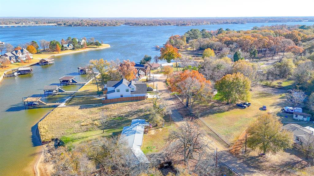 128 Meandering Way Mabank, TX 75156 - Photo 8 of 38 a view of a lake in a city