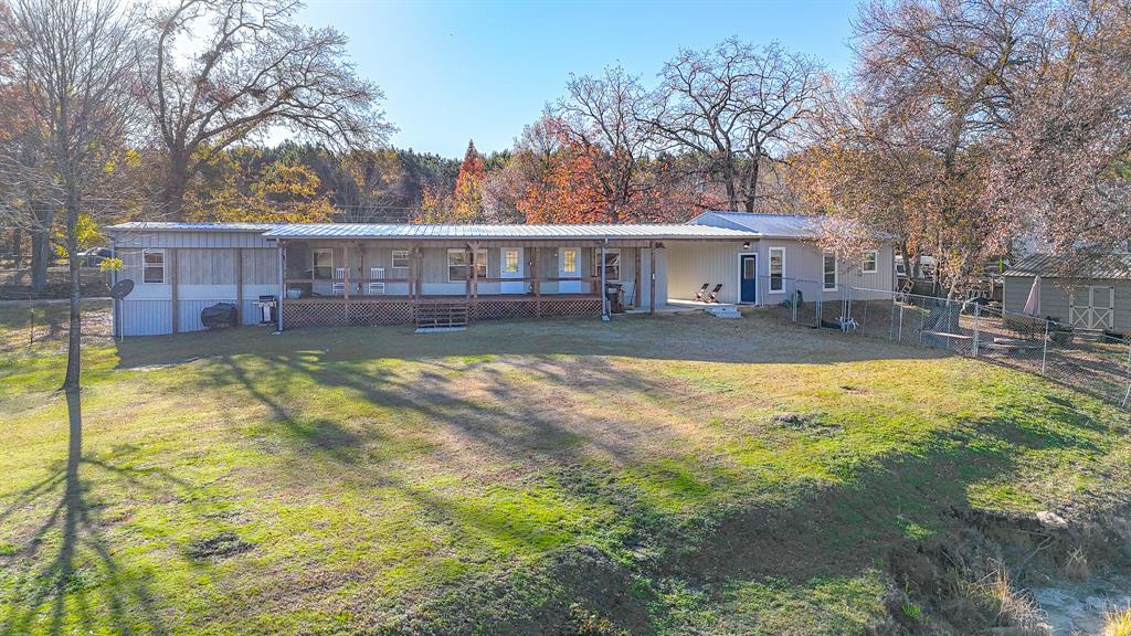 128 Meandering Way Mabank, TX 75156 - Photo 9 of 38 a view of a house with swimming pool
