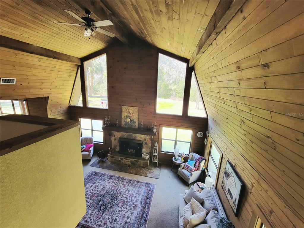 1600 Southwest 42nd Street Ocala, FL 34471 - Photo 6 of 39 a living room with furniture and a window