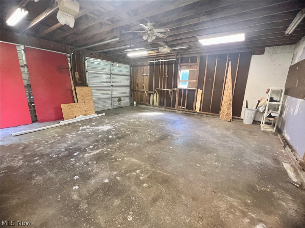 35485 Bashan Road Long Bottom, OH 45743 - Photo 5 of 24 Garage featuring a garage door opener and ceiling fan