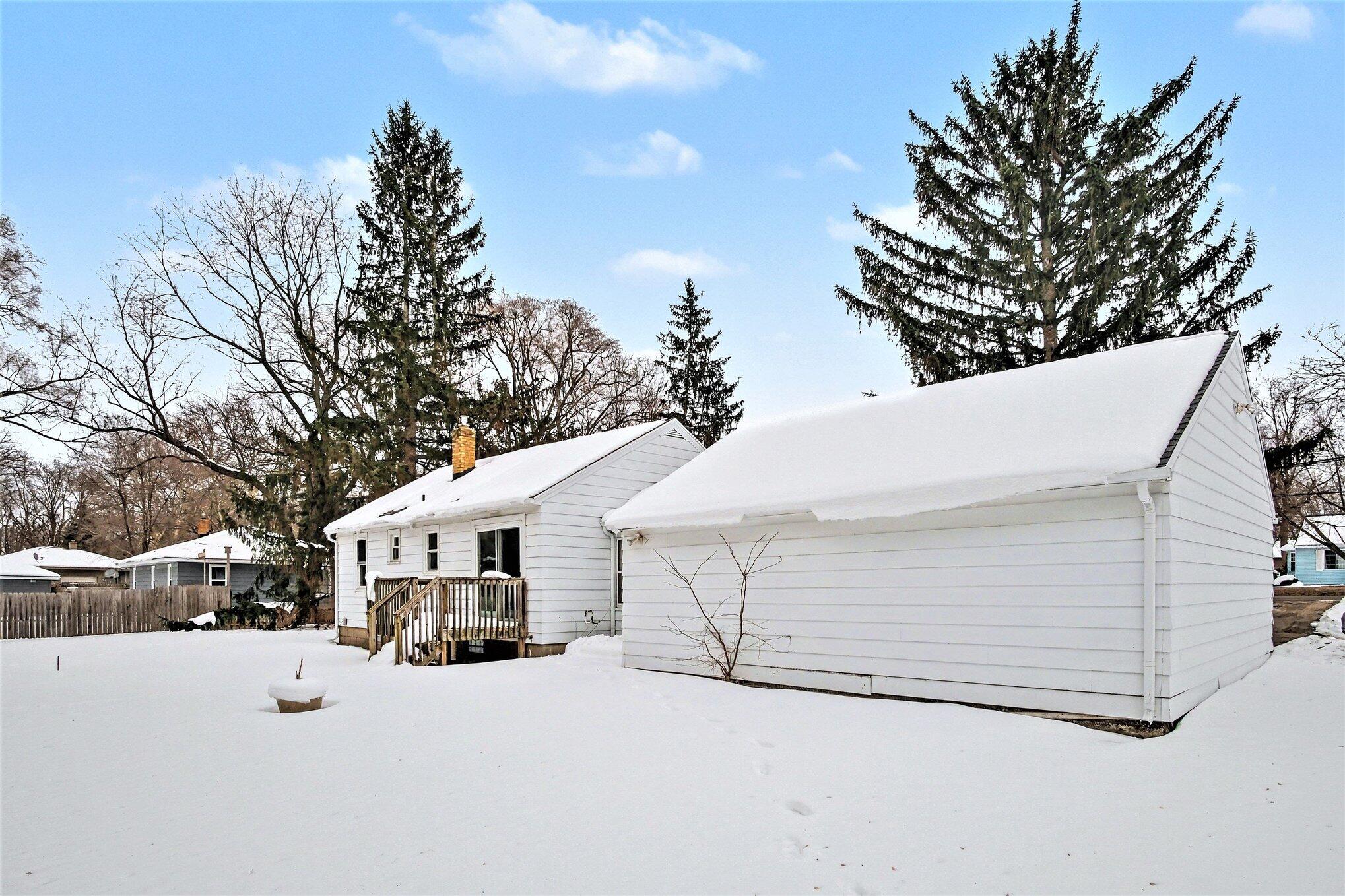 665 4 Mile Road Northwest Comstock Park, MI 49321 - Photo 15 of 18 Back of Home