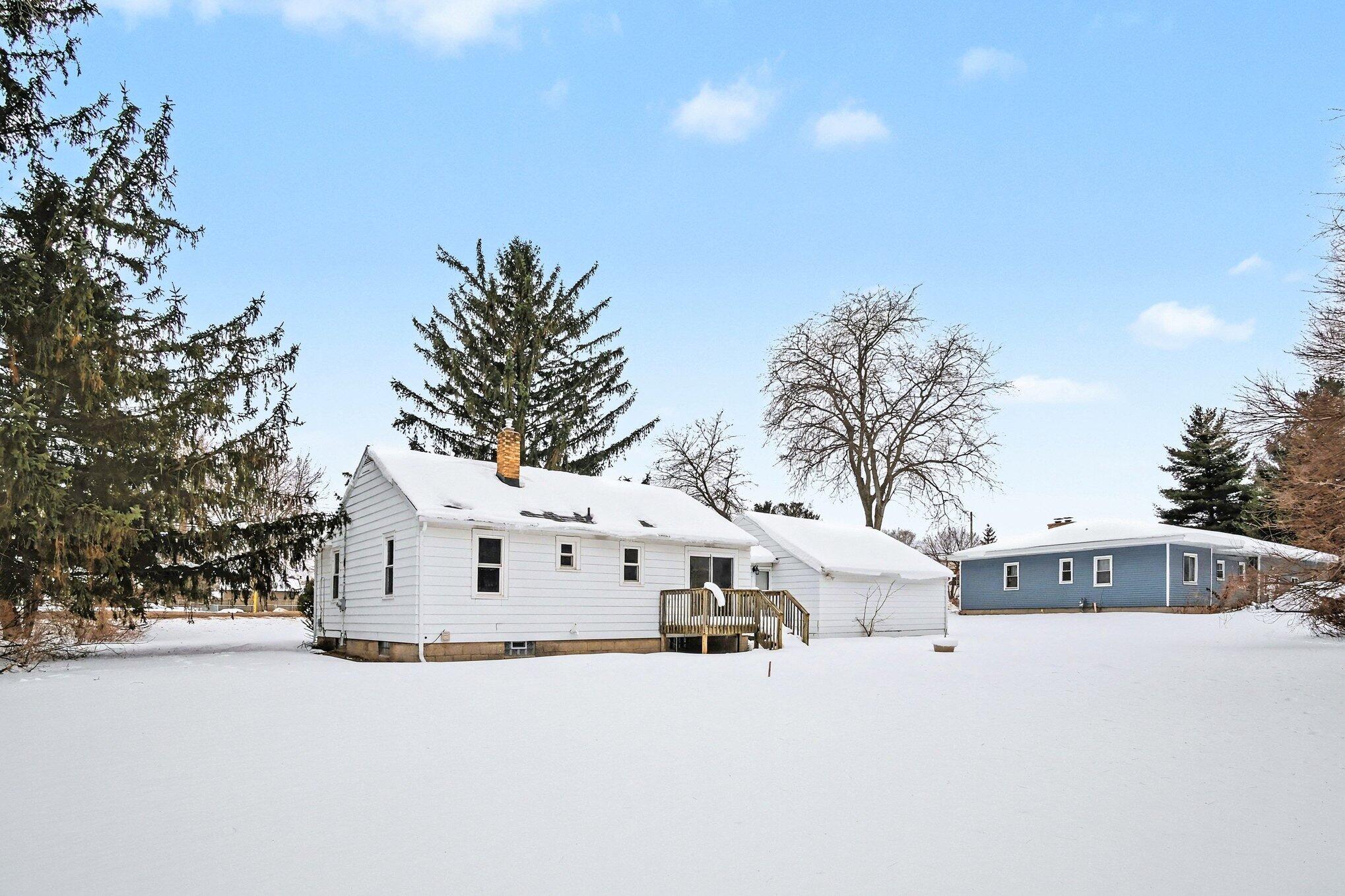 665 4 Mile Road Northwest Comstock Park, MI 49321 - Photo 16 of 18 Back of Home