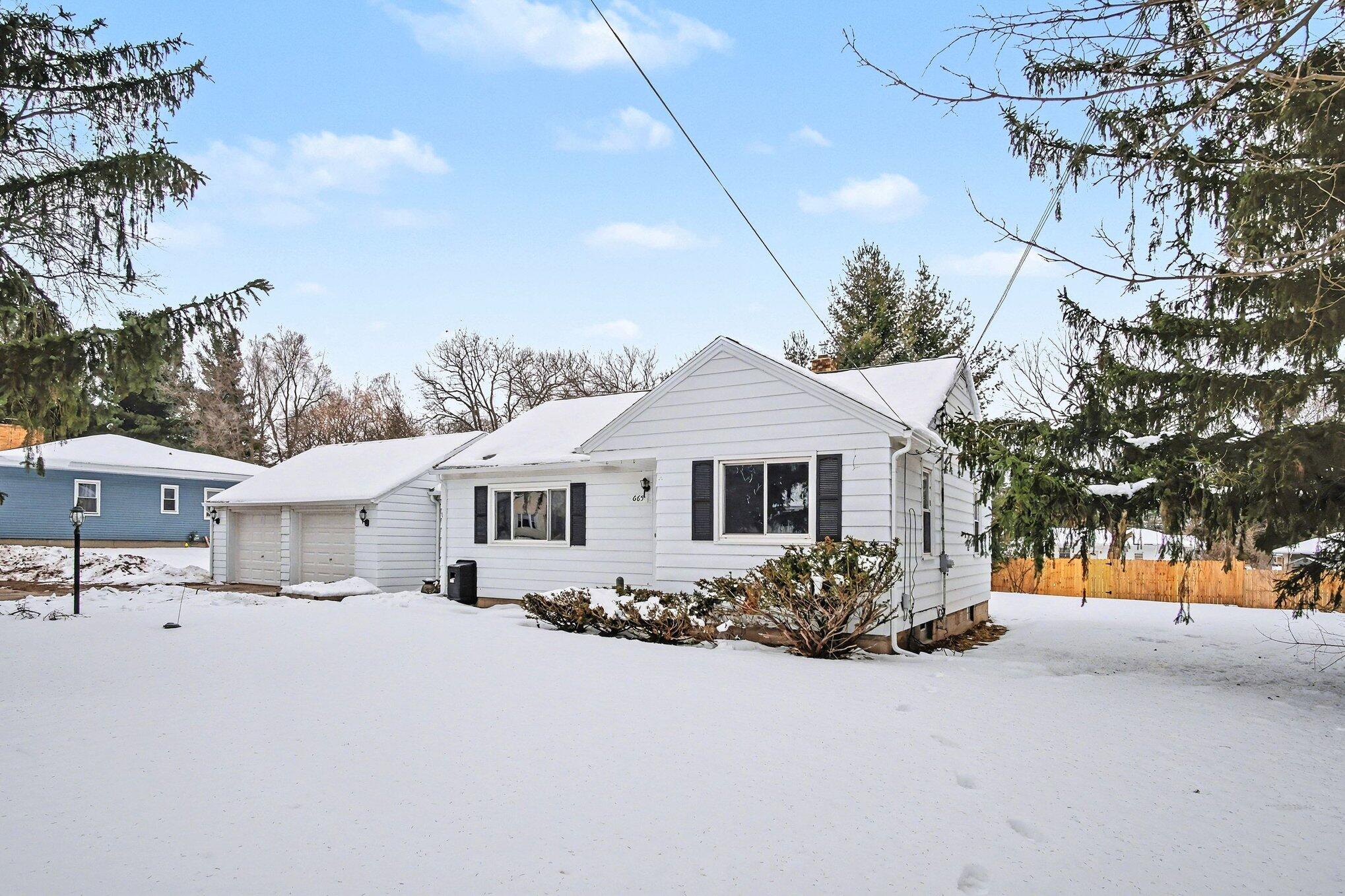 665 4 Mile Road Northwest Comstock Park, MI 49321 - Photo 2 of 18 Front of Home