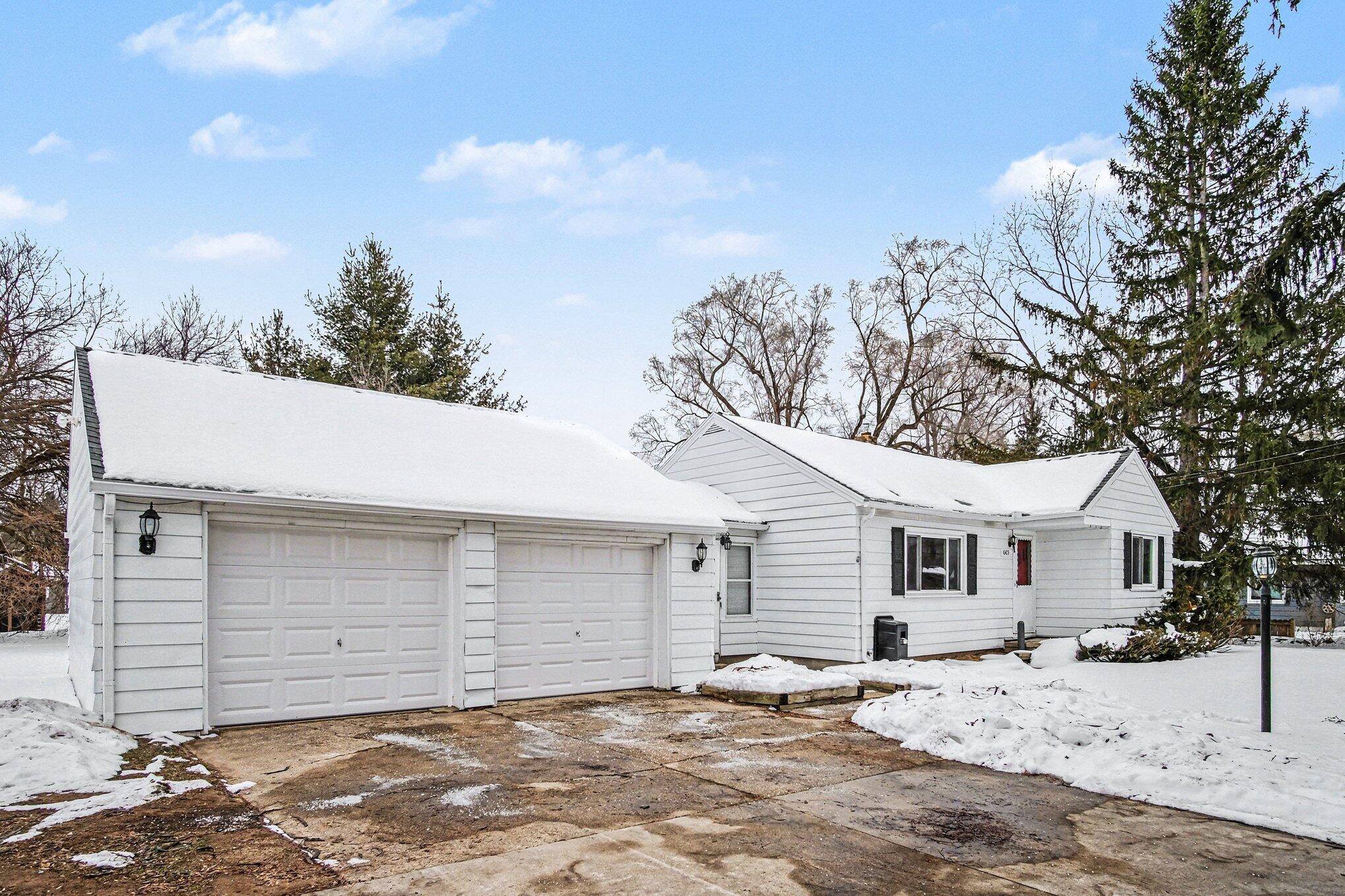 665 4 Mile Road Northwest Comstock Park, MI 49321 - Photo 3 of 18 Front of Home