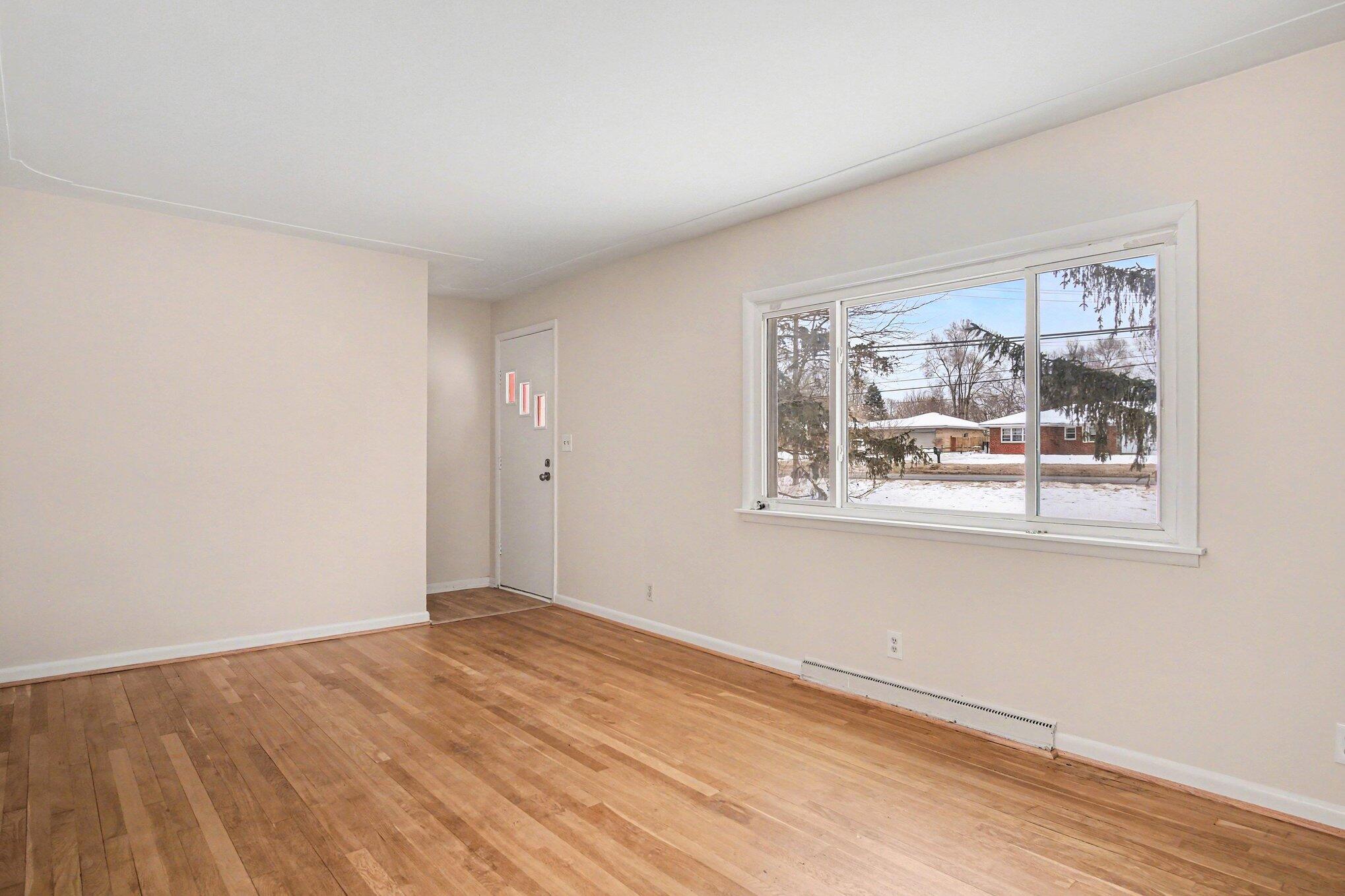 665 4 Mile Road Northwest Comstock Park, MI 49321 - Photo 5 of 18 Living Room