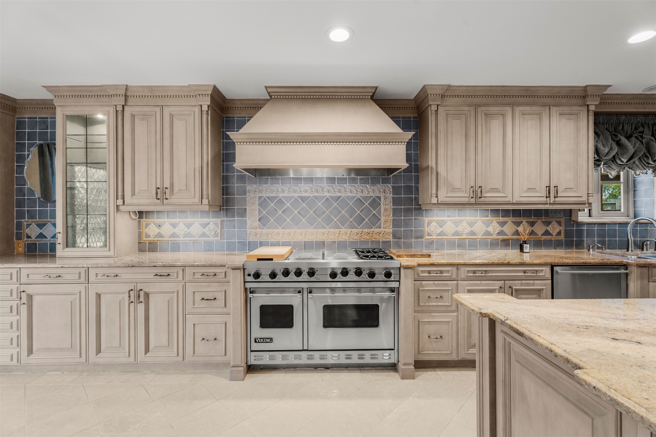 6106 Larkmount Drive Spring, TX 77389 - Photo 12 of 50 Viking range and Subzero refrigerator, custom cabinetry with lighted glass front cabinets and tons of storage and counter space. The chefs in the family will be in heaven.