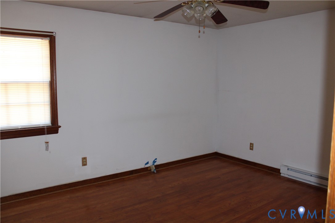 7421 Adkins Road Charles City, VA 23030 - Photo 4 of 14 an empty room with a window