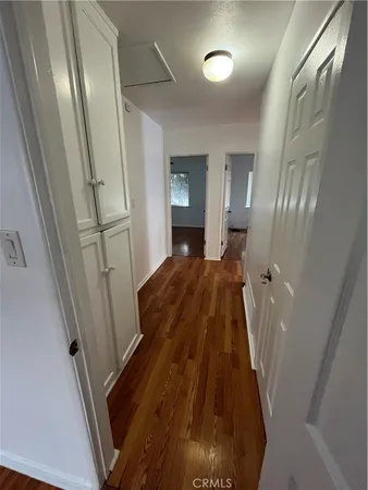 a view of a hallway view with staircase