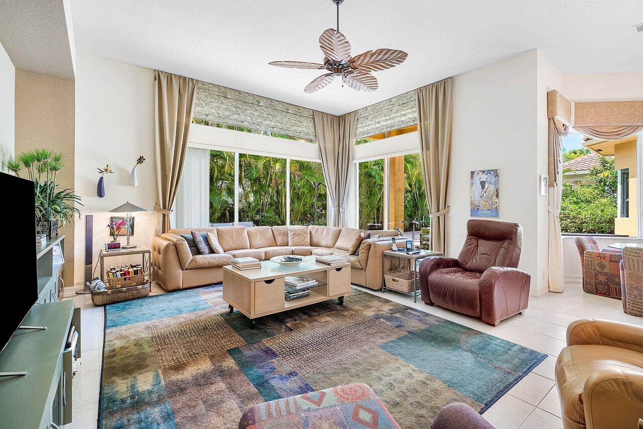 7094 Vía Mediterrania Boca Raton, FL 33433 - Photo 18 of 46 a living room with furniture and a large window
