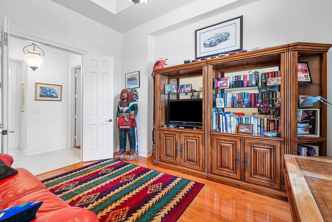 7094 Vía Mediterrania Boca Raton, FL 33433 - Photo 20 of 46 a bedroom with furniture and a flat screen tv