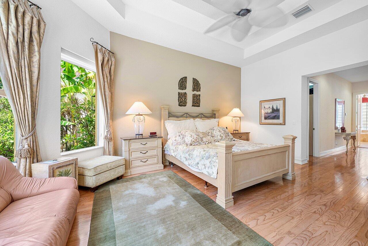 7094 Vía Mediterrania Boca Raton, FL 33433 - Photo 25 of 46 a living room with furniture and a large window
