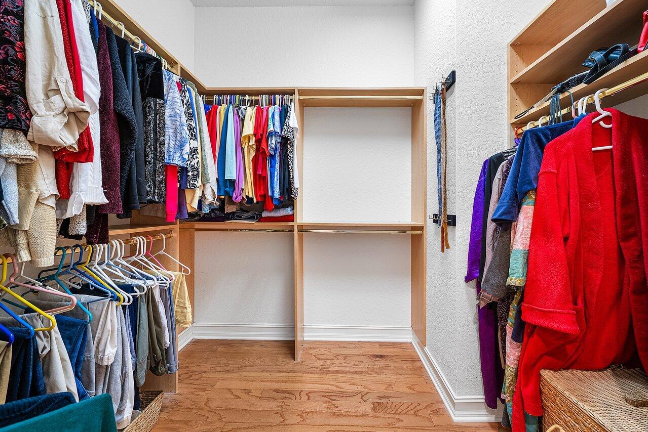 7094 Vía Mediterrania Boca Raton, FL 33433 - Photo 26 of 46 a view of walk in closet with clothes and shoes