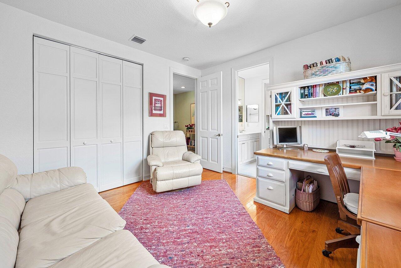 7094 Vía Mediterrania Boca Raton, FL 33433 - Photo 40 of 46 a living room with furniture and a wooden floor