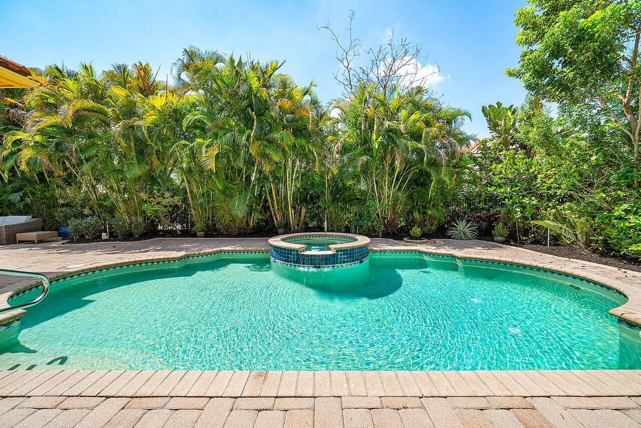 7094 Vía Mediterrania Boca Raton, FL 33433 - Photo 41 of 46 a view of swimming pool from a yard