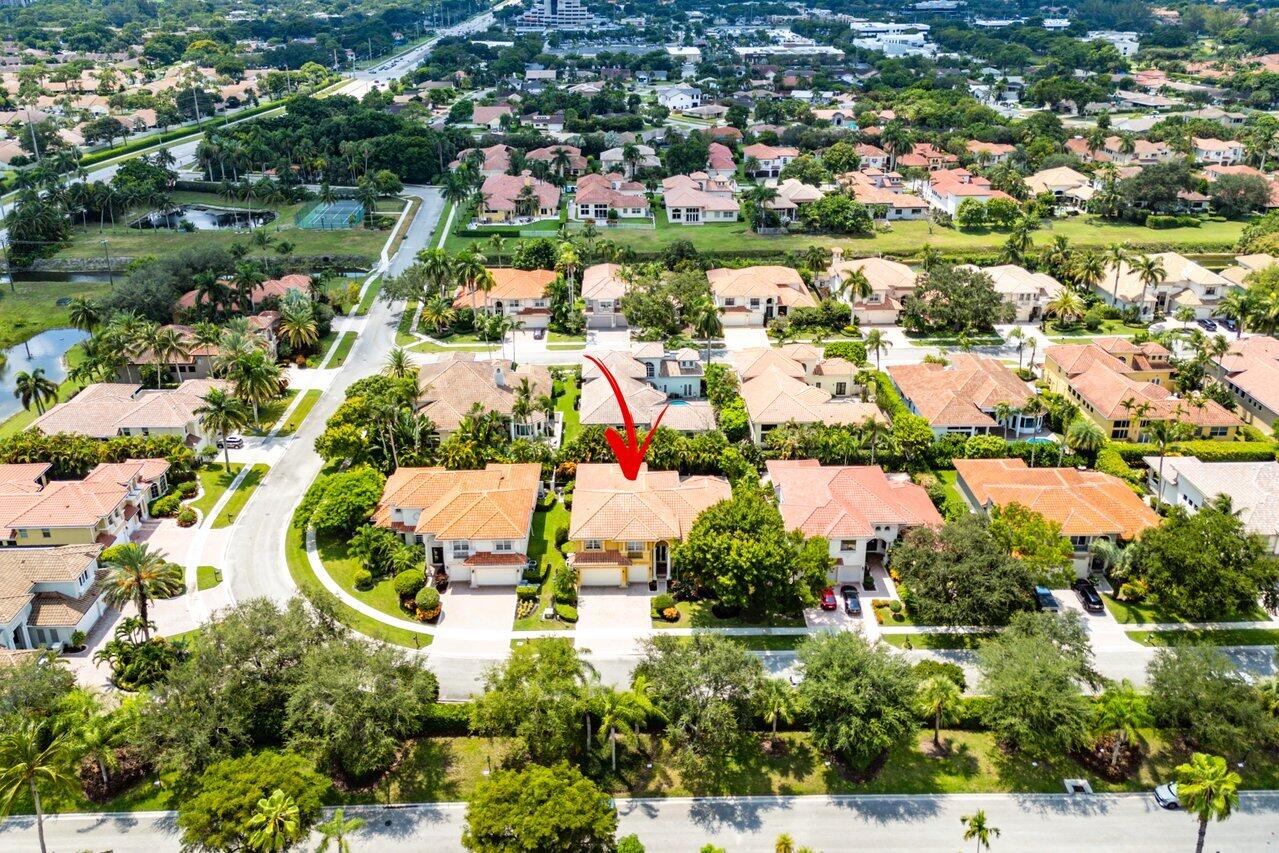 7094 Vía Mediterrania Boca Raton, FL 33433 - Photo 46 of 46 an aerial view of residential houses with outdoor space and trees