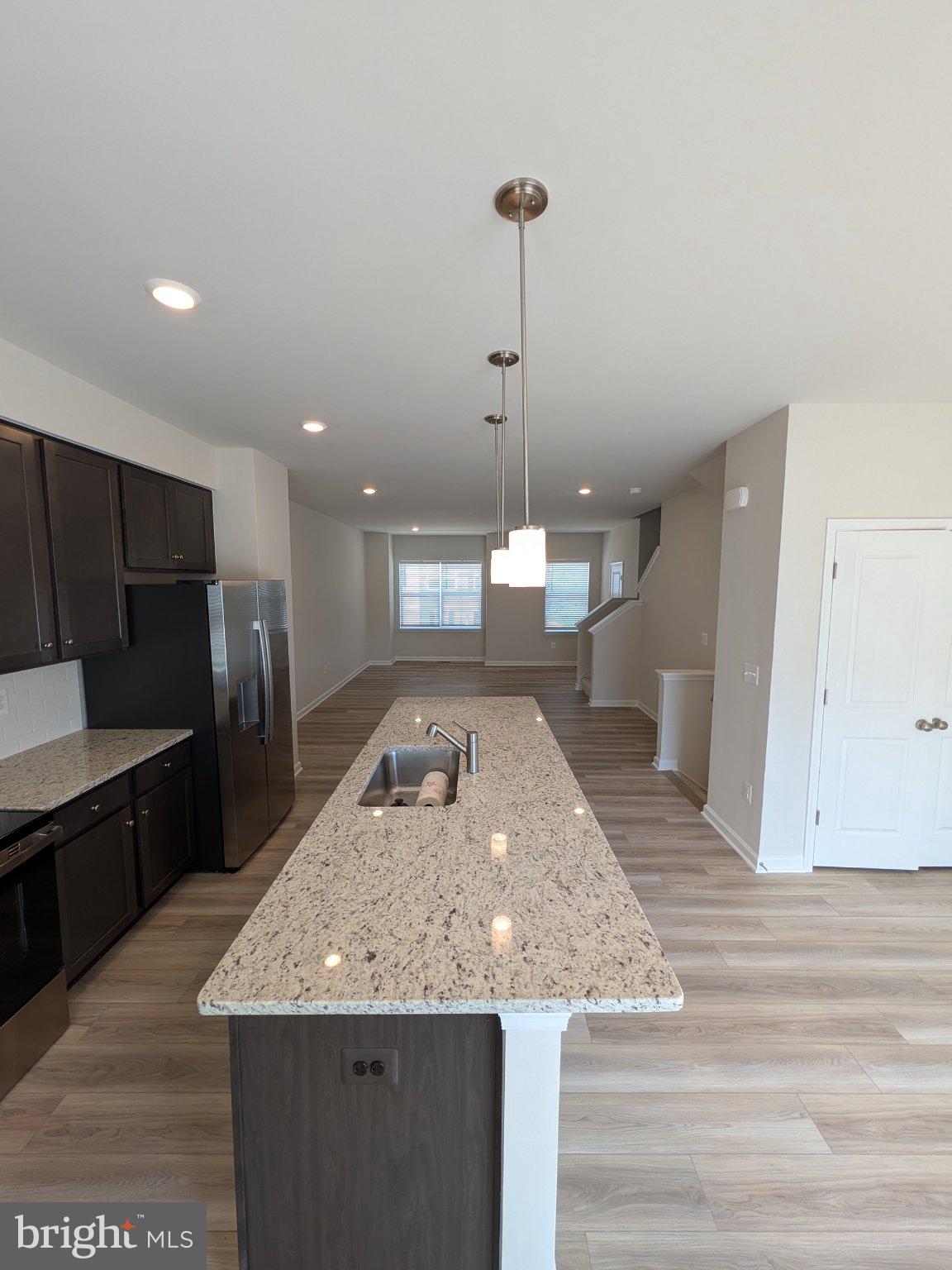 278 Swan Fld Avenue Ranson, WV 25438 - Photo 17 of 33 Modern kitchen with sleek finishes.