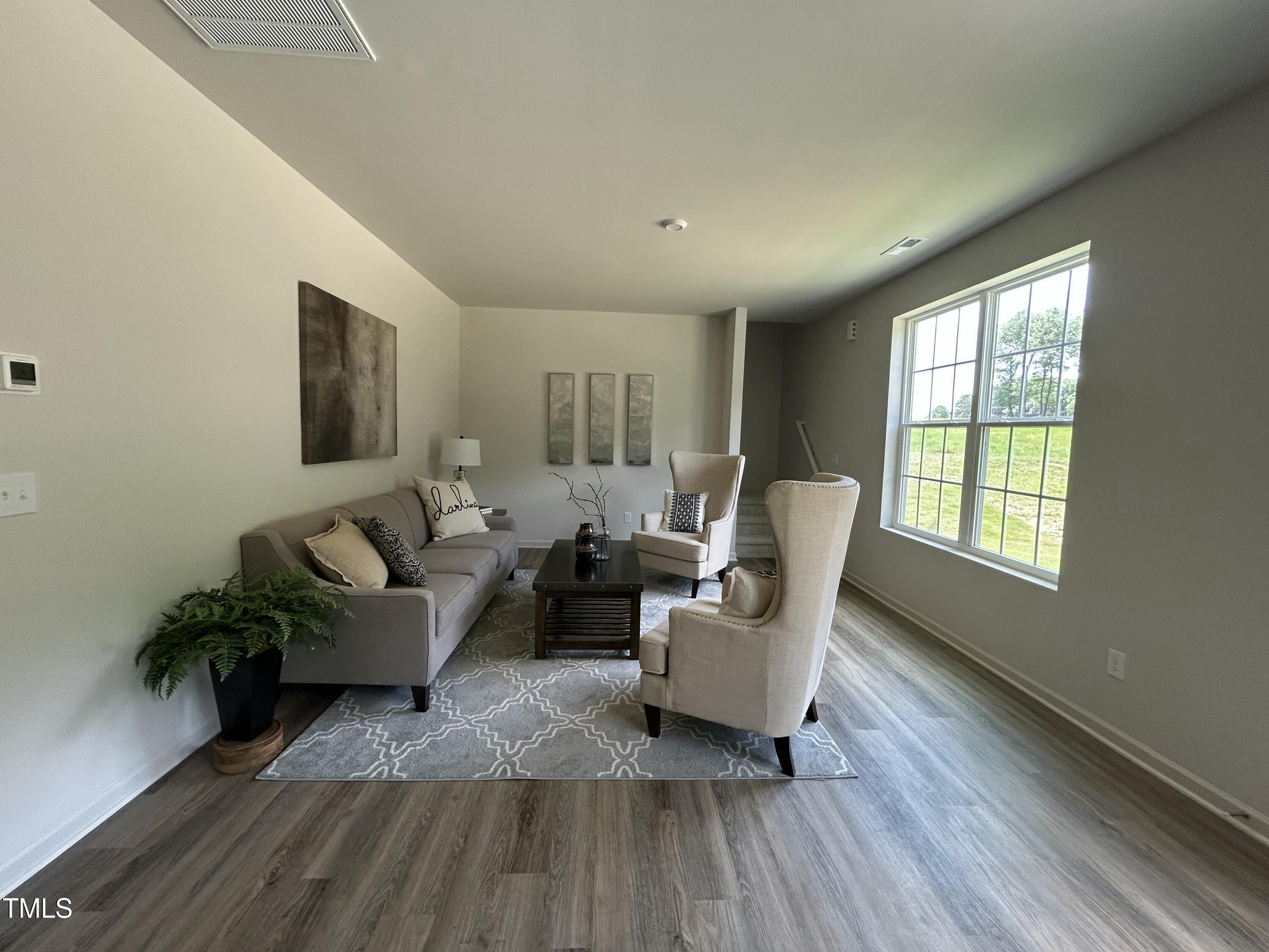 259 Johnson Rdg Way Four Oaks, NC 27524 - Photo 11 of 22 JR 13 Camden Livingroom (Staged)