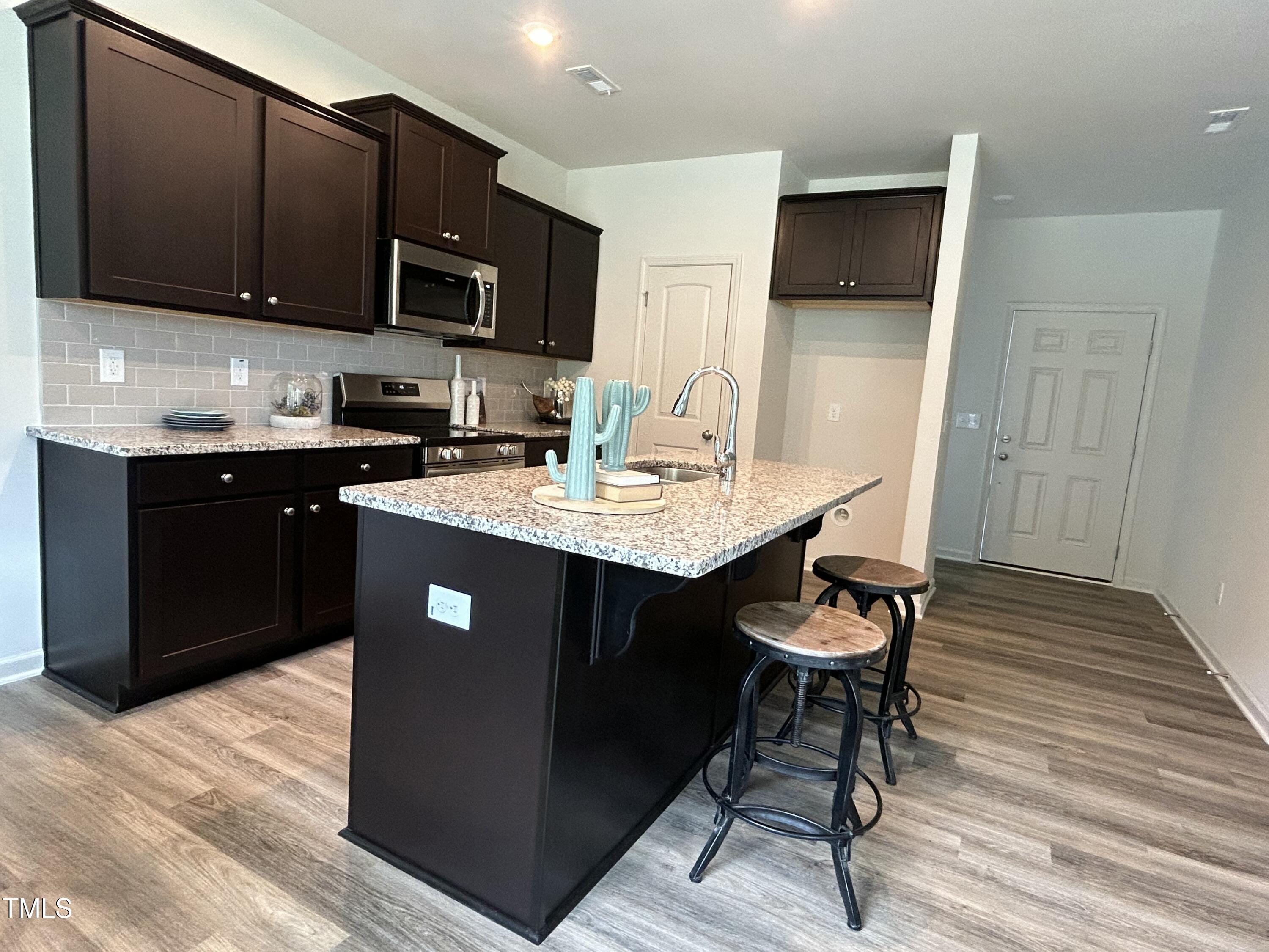 259 Johnson Rdg Way Four Oaks, NC 27524 - Photo 7 of 22 JR 13 Camden Kitchen (Staged)