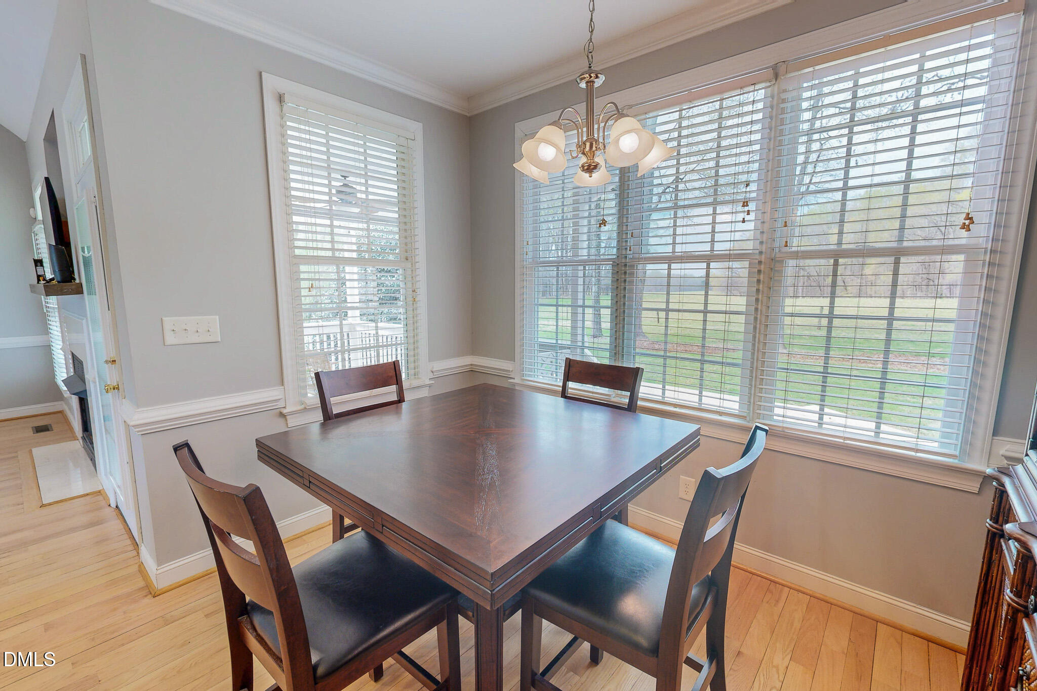 353 Fletcher Ridge Road Timberlake, NC 27583 - Photo 31 of 44 a view of a dining room with furniture and window