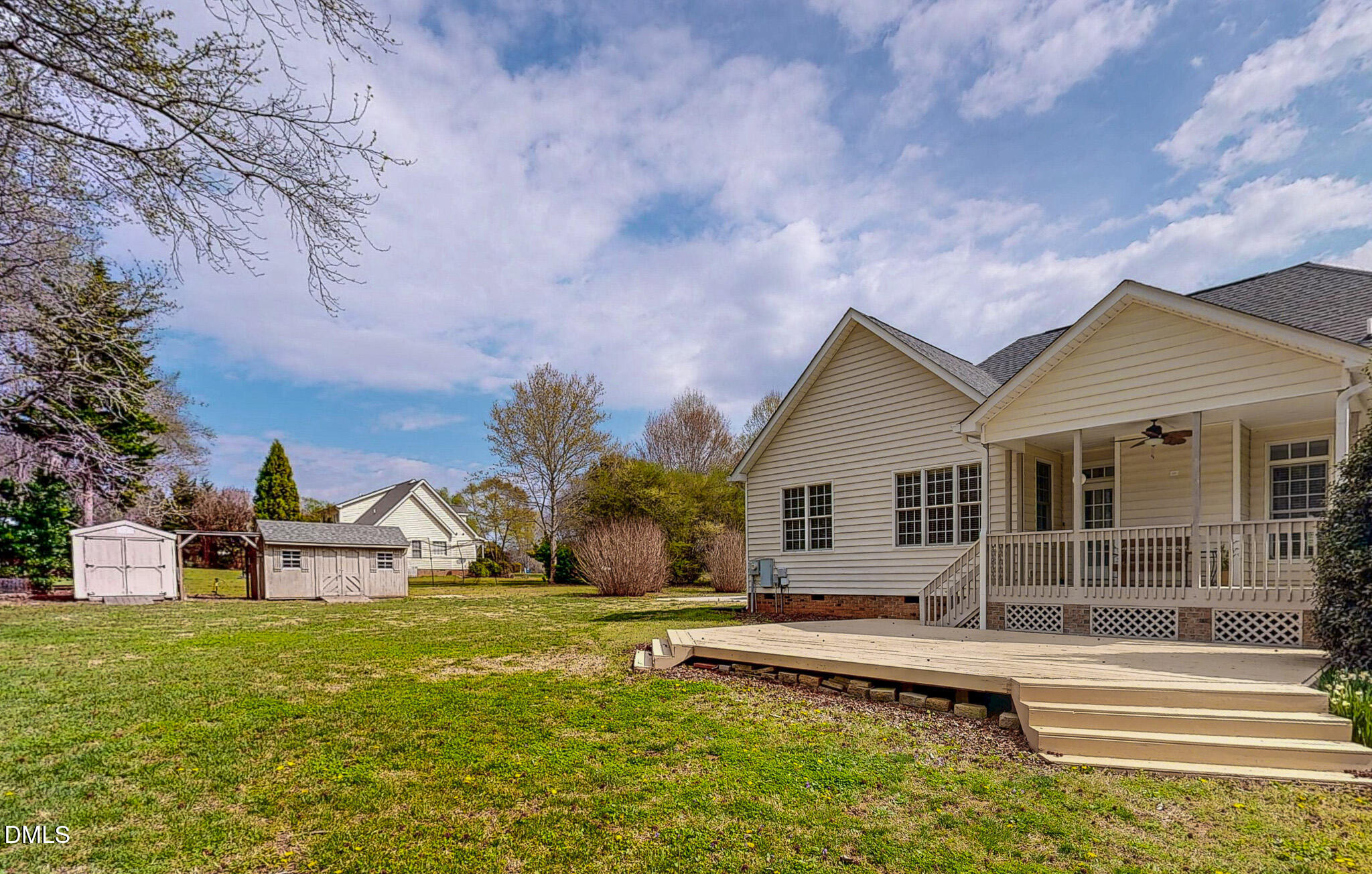 353 Fletcher Ridge Road Timberlake, NC 27583 - Photo 44 of 44 a view of house with yard and green space