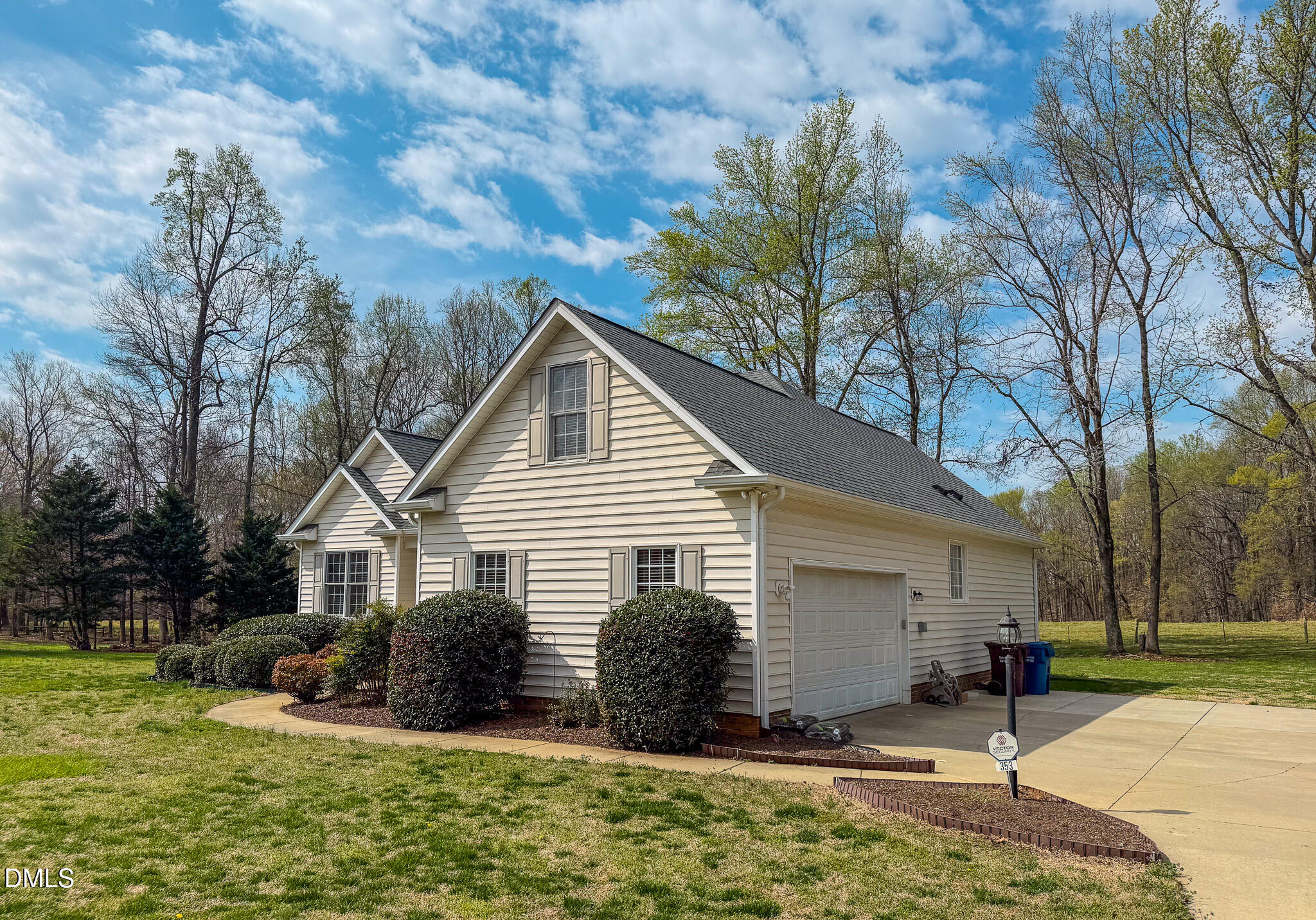 353 Fletcher Ridge Road Timberlake, NC 27583 - Photo 8 of 44 a view of a house with backyard and trees