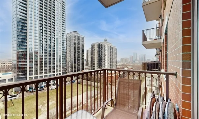 a view of balcony with a small yard