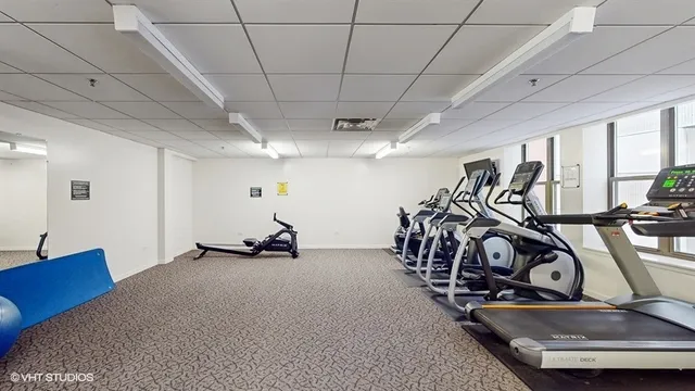 a view of a room with gym equipment