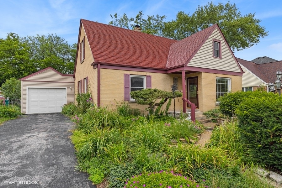 238 West Hickory Road Lombard, IL 60148 - Photo 1 of 17 a aerial view of a house with yard and green space