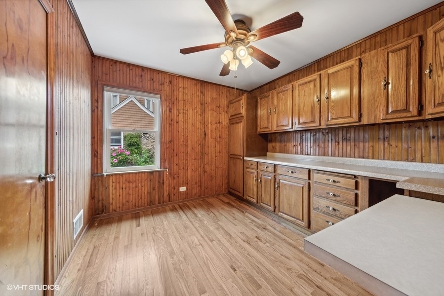 238 West Hickory Road Lombard, IL 60148 - Photo 8 of 17 a kitchen with cabinets a sink and appliances
