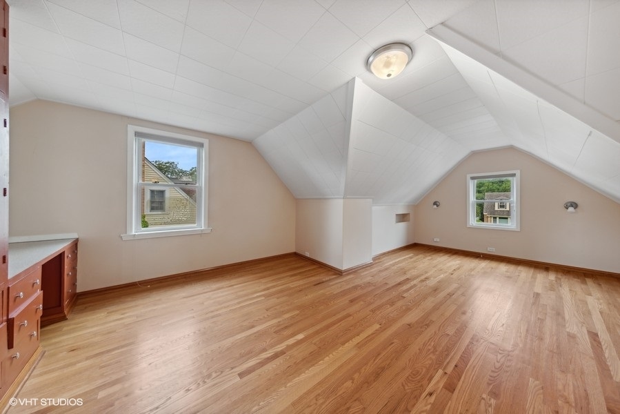 238 West Hickory Road Lombard, IL 60148 - Photo 10 of 17 a view of an empty room window and wooden floor