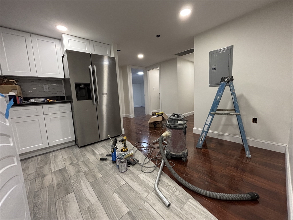4 Appleton Street, Unit D Quincy, MA 02171 - Photo 3 of 12 a view of a room with gym equipment
