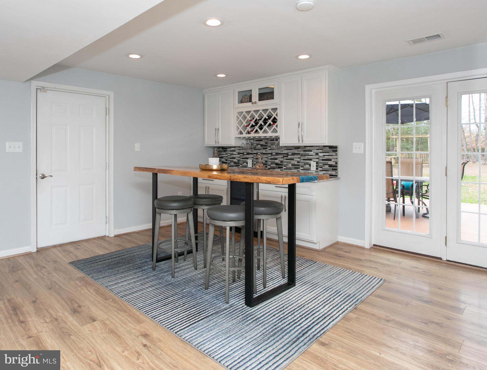 6585 Fire Tower Road Welcome, MD 20693 - Photo 25 of 46 Lower Level Eating Area w/Exit to Deck