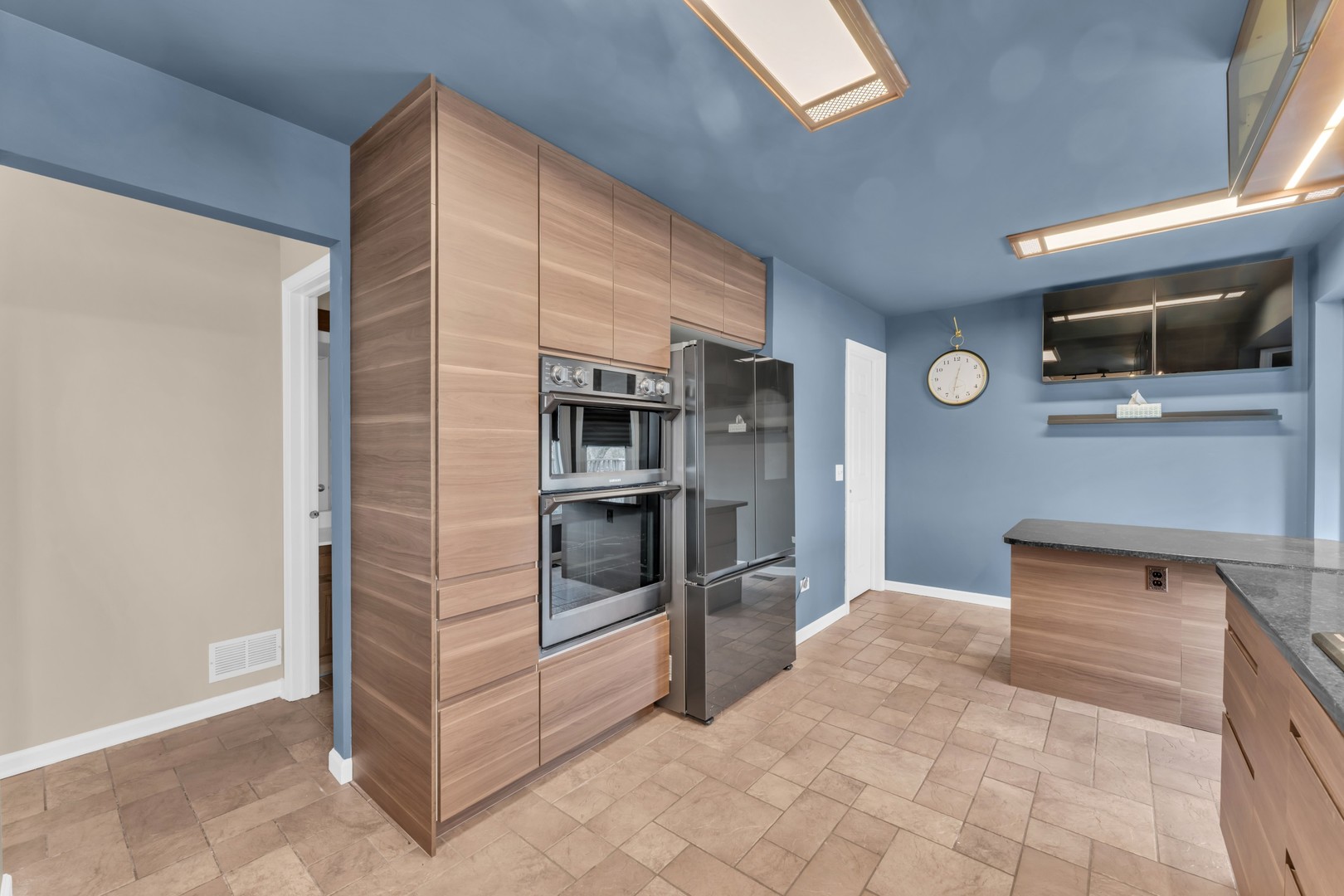 6063 Morningside Court Gurnee, IL 60031 - Photo 11 of 58 a kitchen with stainless steel appliances a refrigerator and a stove top oven
