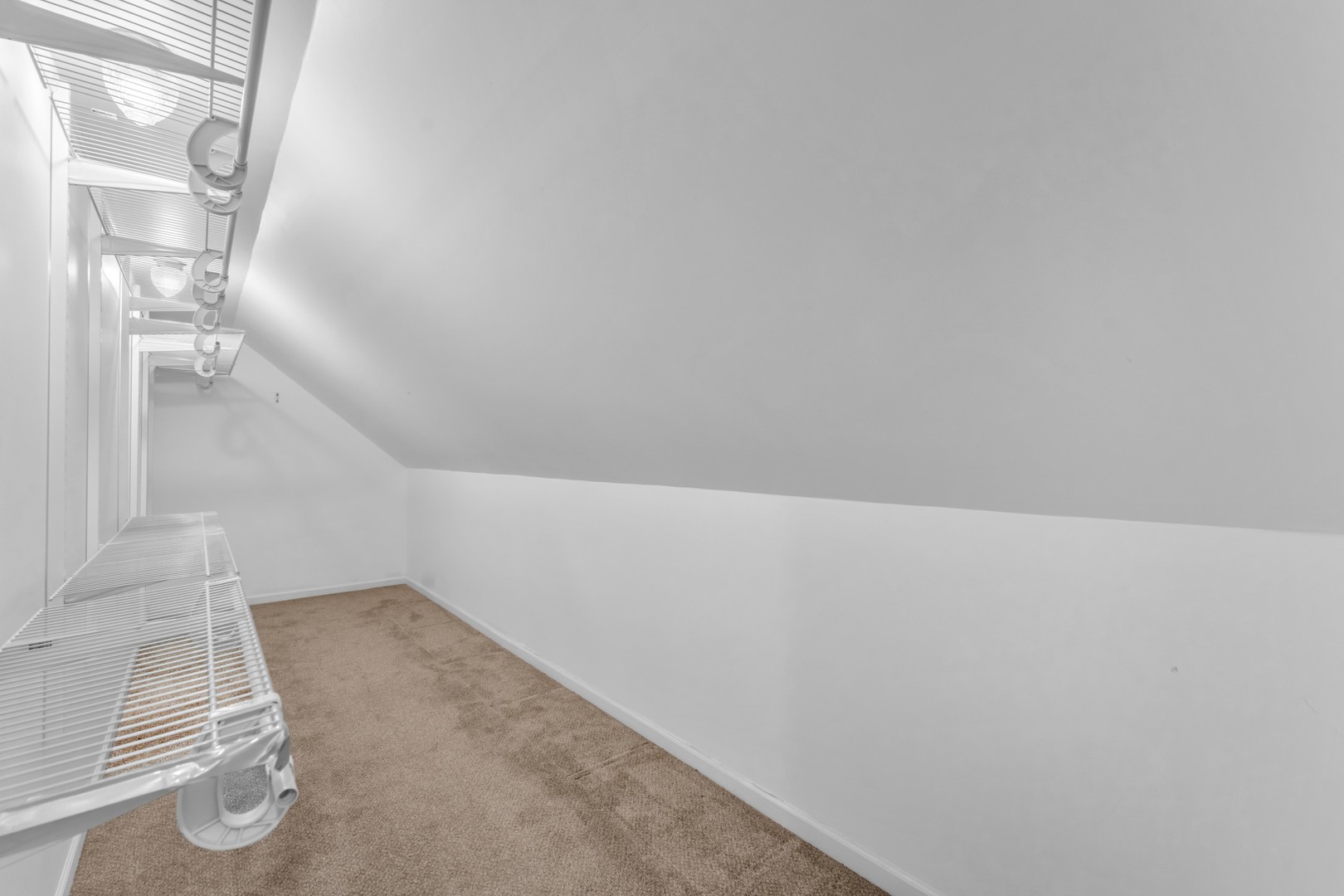 6063 Morningside Court Gurnee, IL 60031 - Photo 26 of 58 a view of a room with racks on the wall